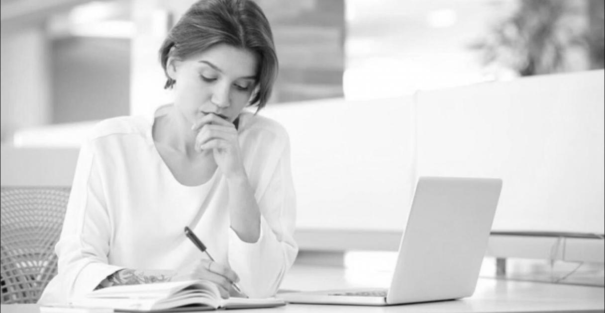 Instructor providing feedback during production workshop
